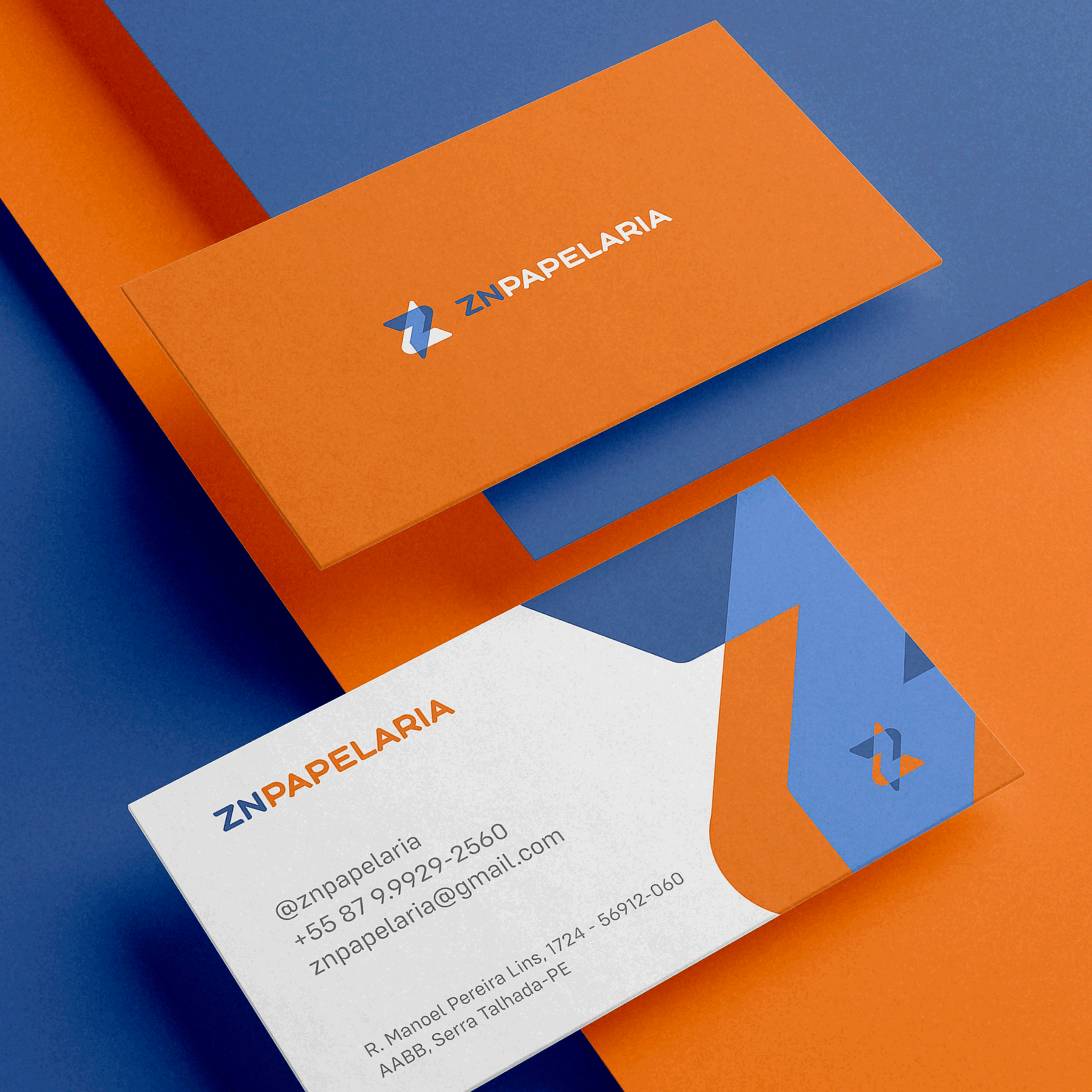 Identidade visual da ZN Papelaria em azul e laranja